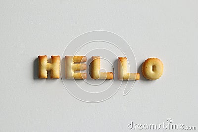 Inscription from the cookies on the white background. Text â€“ Hello. Stock Photo